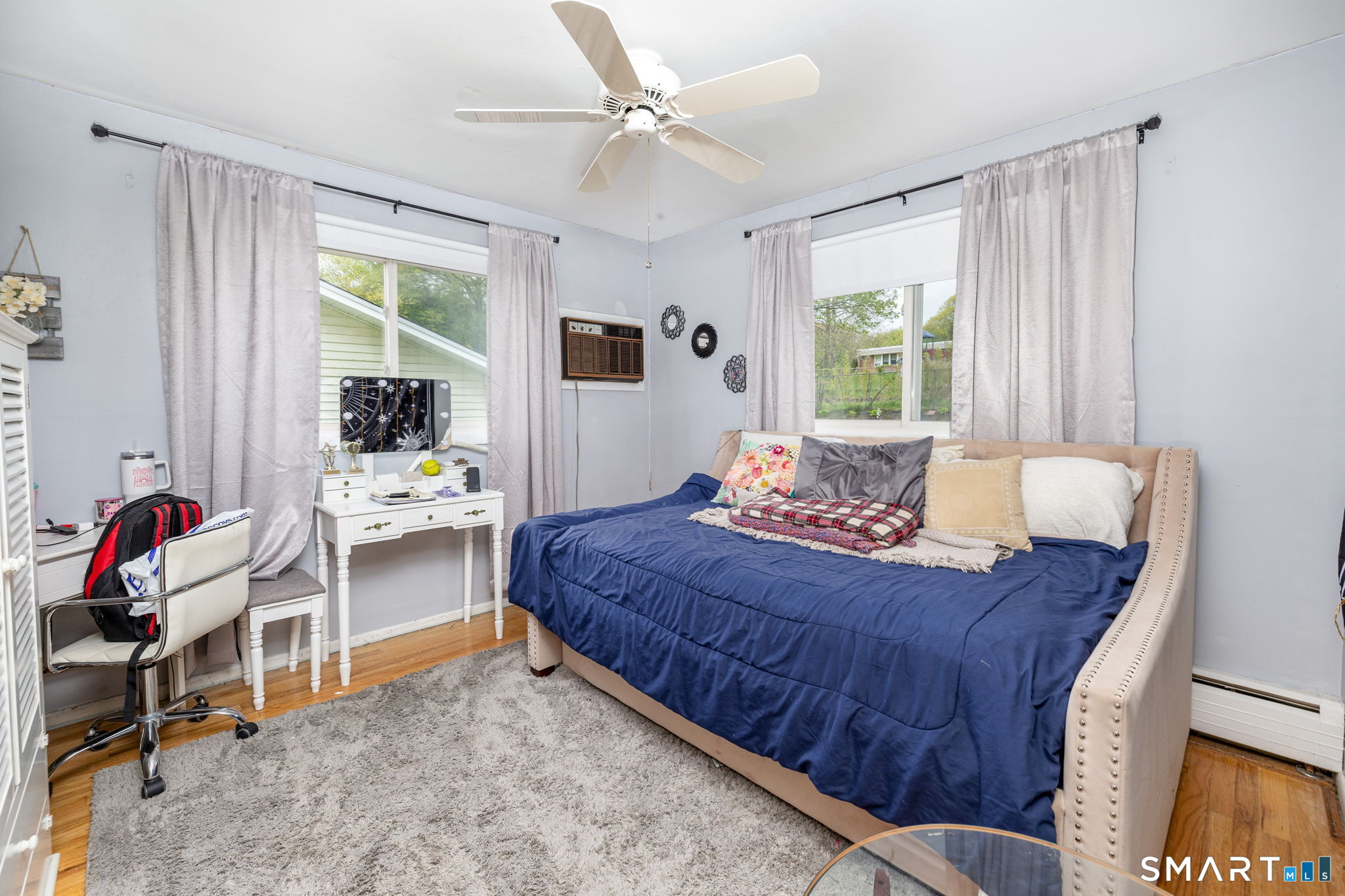 325 Barbara Road Middletown, CT 06457 - Photo 30 of 40 a bed room with a bed and a chair