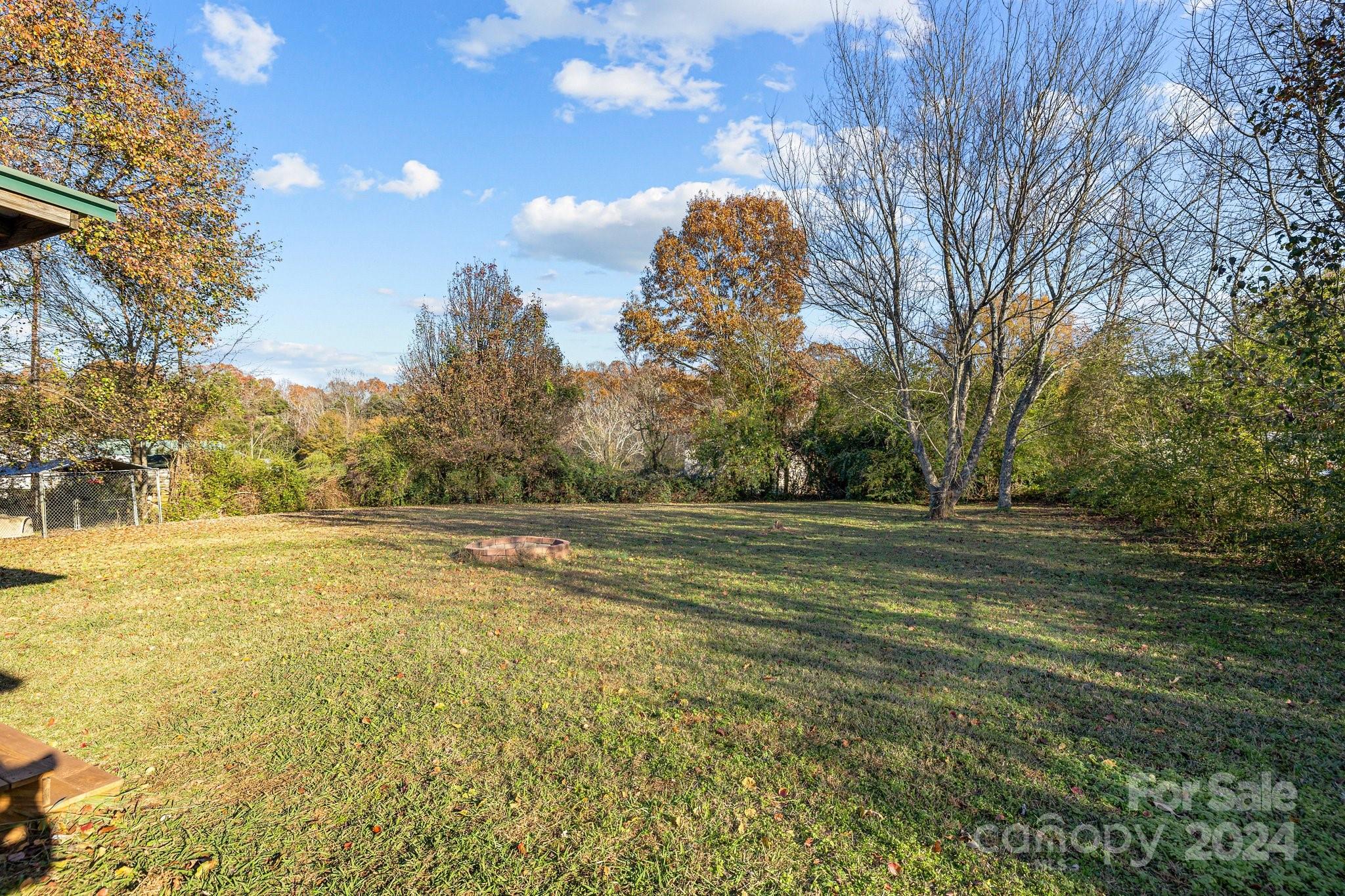 8450 Renee Ford Road Stanfield, NC 28163 - Photo 28 of 39 a view of an ocean and a yard