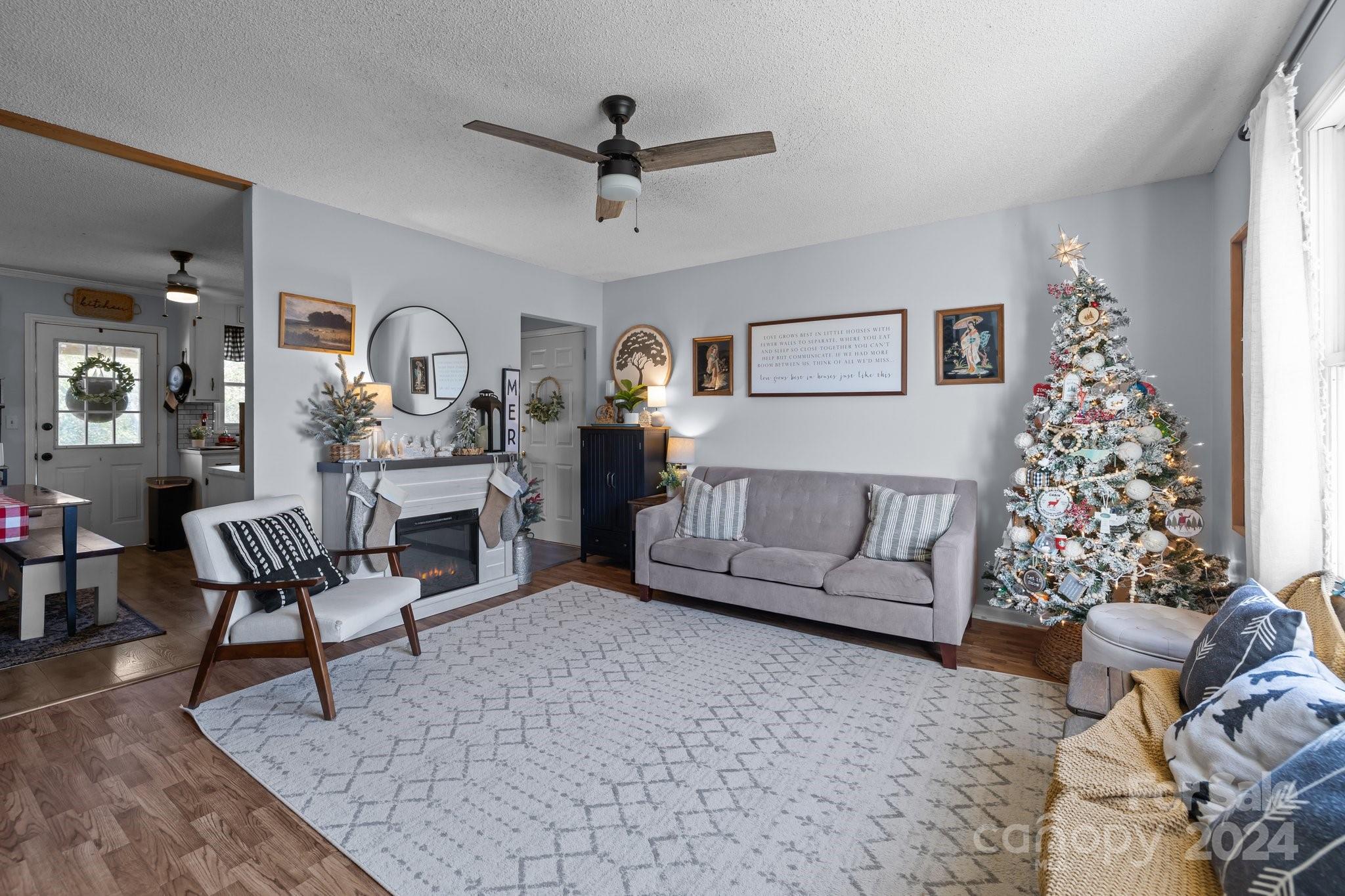 8450 Renee Ford Road Stanfield, NC 28163 - Photo 4 of 39 a living room with furniture and a large window