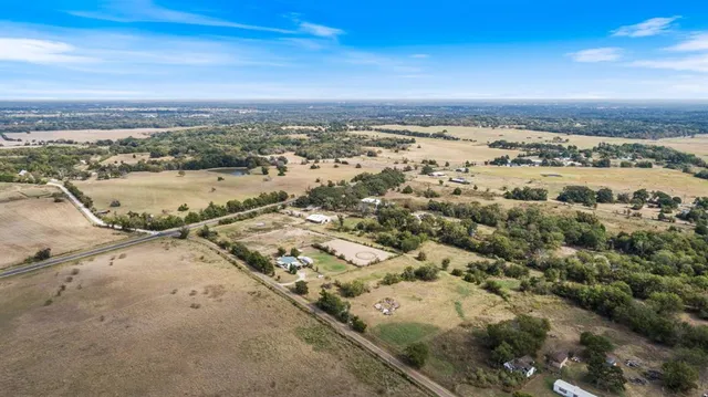 an aerial view of beach and city space