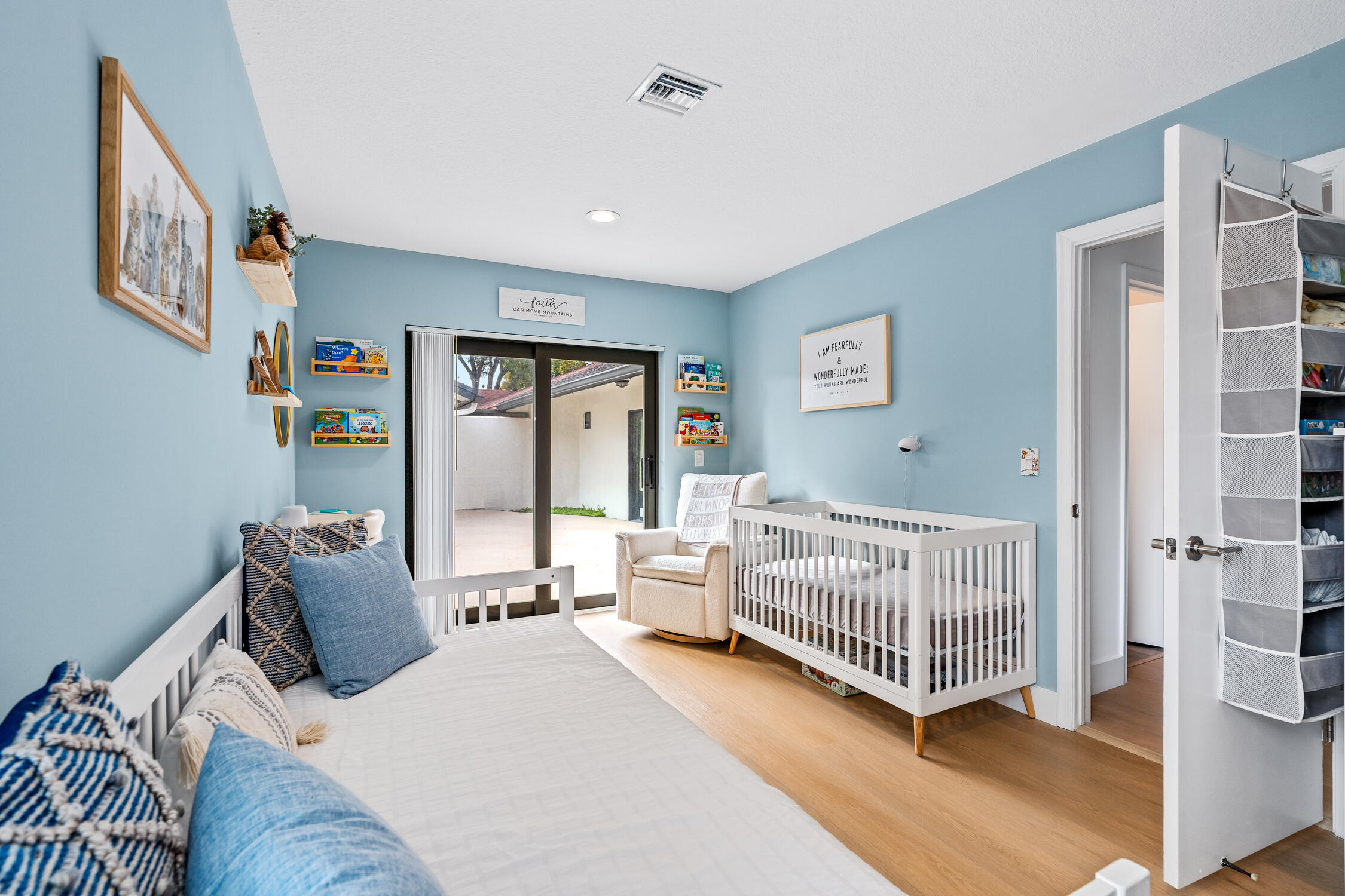 23368 Southwest 53rd Avenue, Unit C Boca Raton, FL 33433 - Photo 19 of 32 a bedroom with furniture and a window