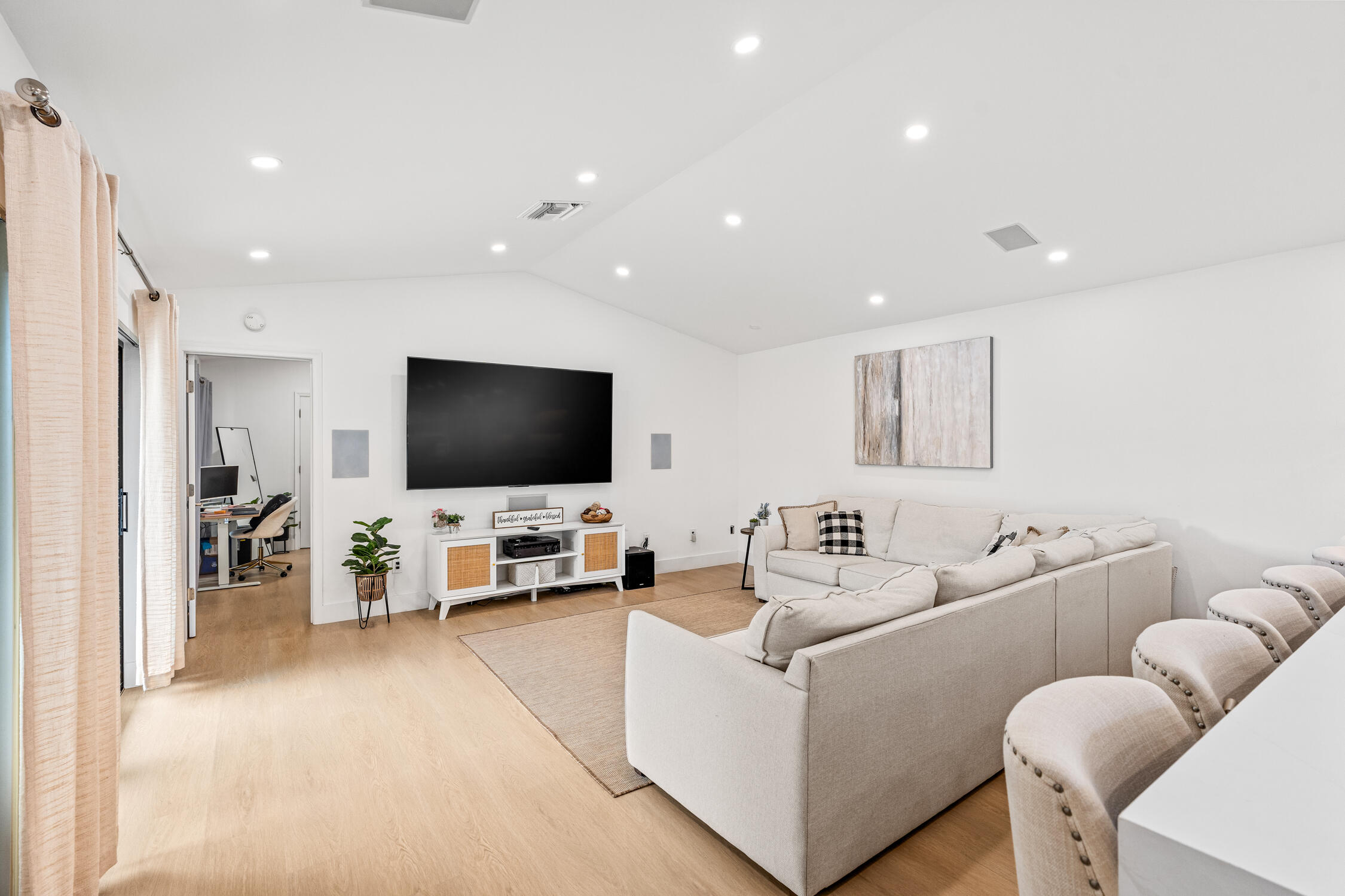 23368 Southwest 53rd Avenue, Unit C Boca Raton, FL 33433 - Photo 2 of 32 a living room with furniture and a flat screen tv