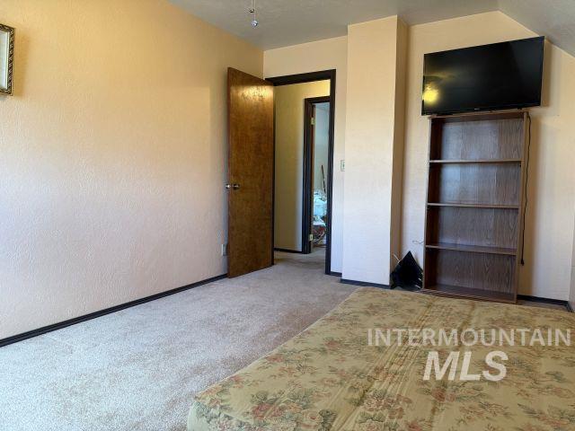 848 Jonathan Road Weiser, ID 83672 - Photo 19 of 42 Unfurnished bedroom featuring carpet flooring