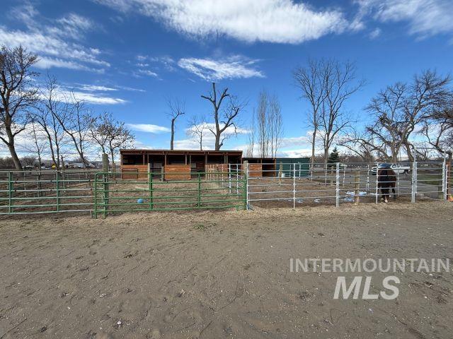 848 Jonathan Road Weiser, ID 83672 - Photo 34 of 42 Horse barn featuring a view of rural / pastoral area