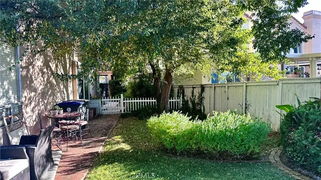 a view of a deck with a yard