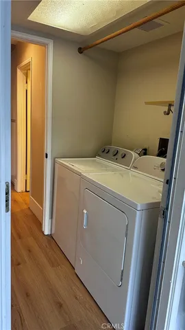 a bedroom with a bed and dresser