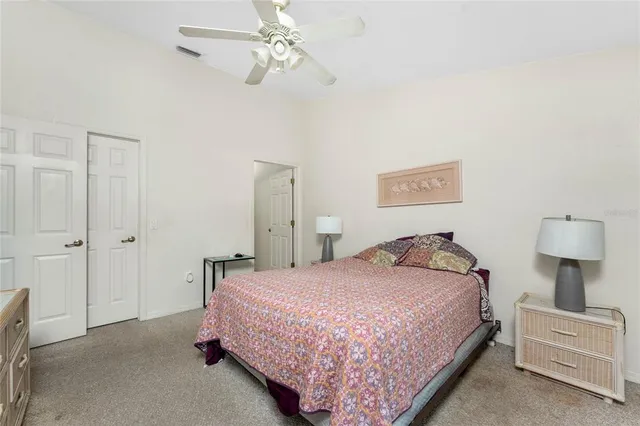 a bathroom with a sink a toilet and shower curtain