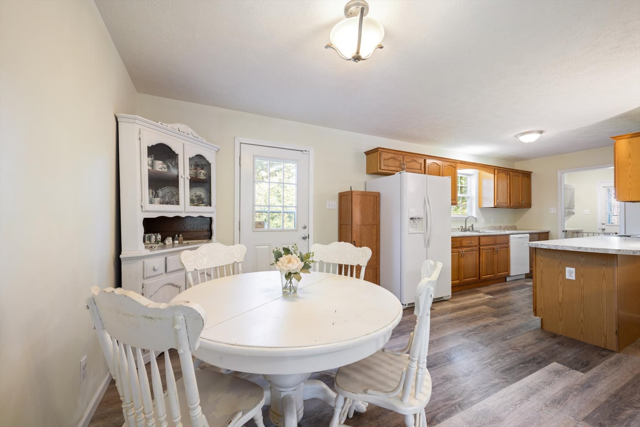 1318 Yellow Creek Road Dickson, TN 37055 - Photo 11 of 37 a view of a dining room with furniture and wooden floor