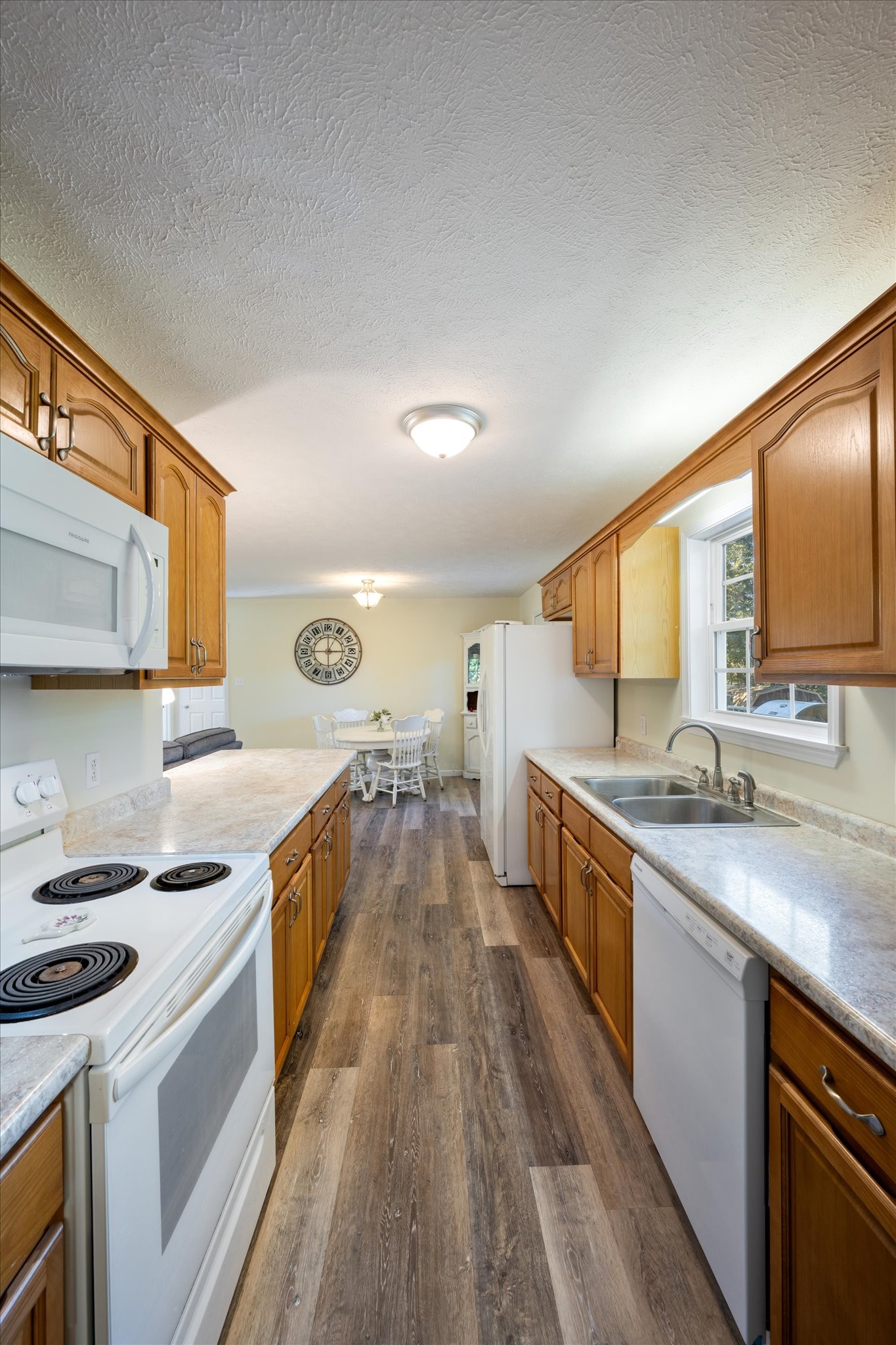 1318 Yellow Creek Road Dickson, TN 37055 - Photo 14 of 37 a large kitchen with a stove and cabinets