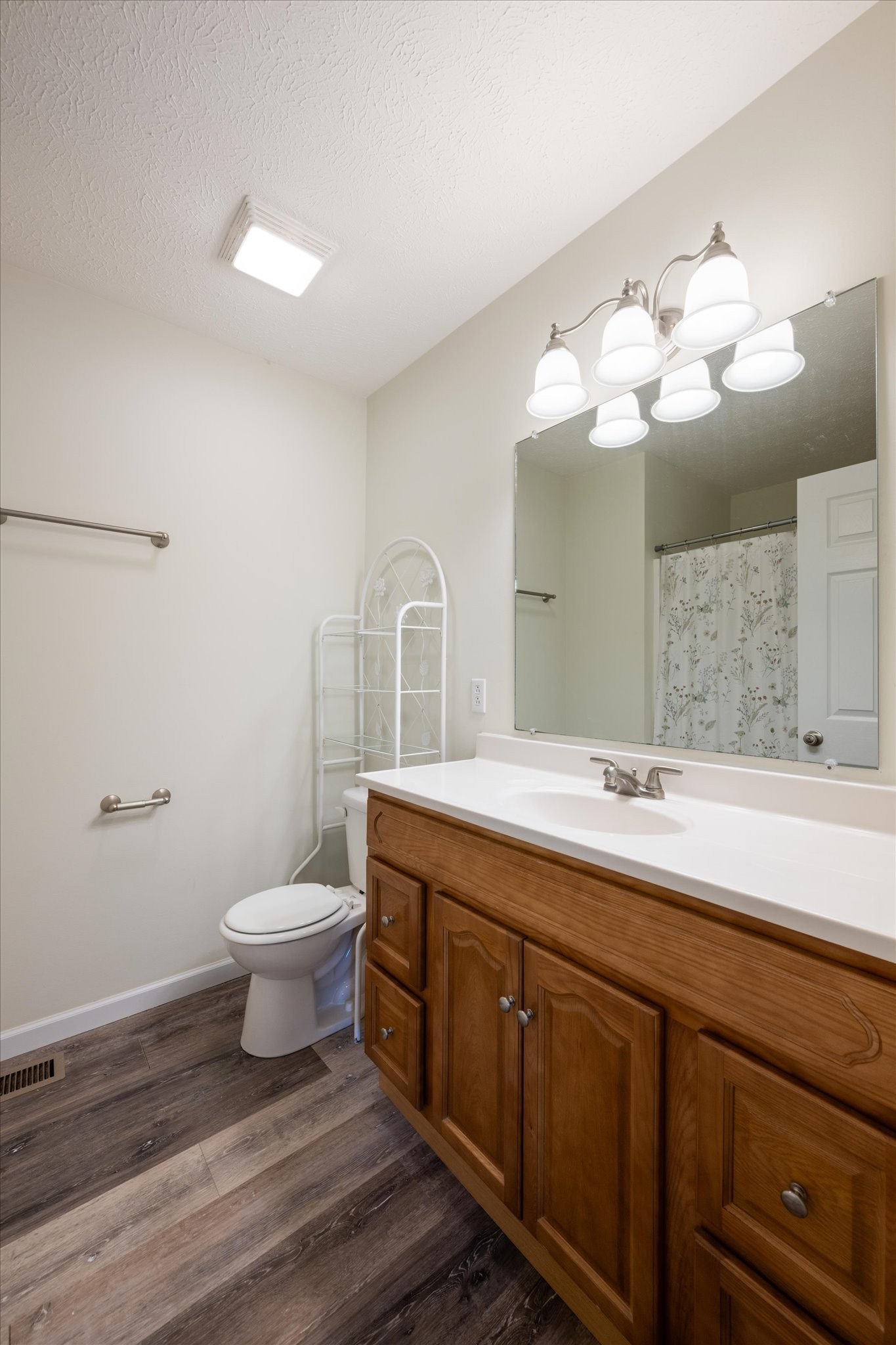 1318 Yellow Creek Road Dickson, TN 37055 - Photo 17 of 37 a bathroom with a toilet sink and mirror