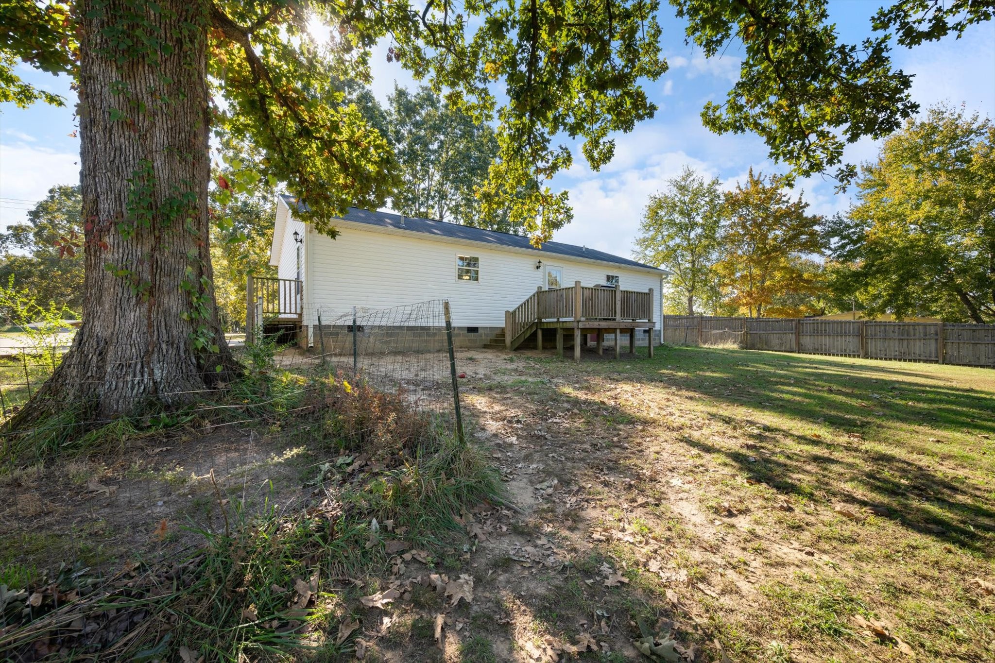 1318 Yellow Creek Road Dickson, TN 37055 - Photo 27 of 37 a backyard of a house with lots of green space