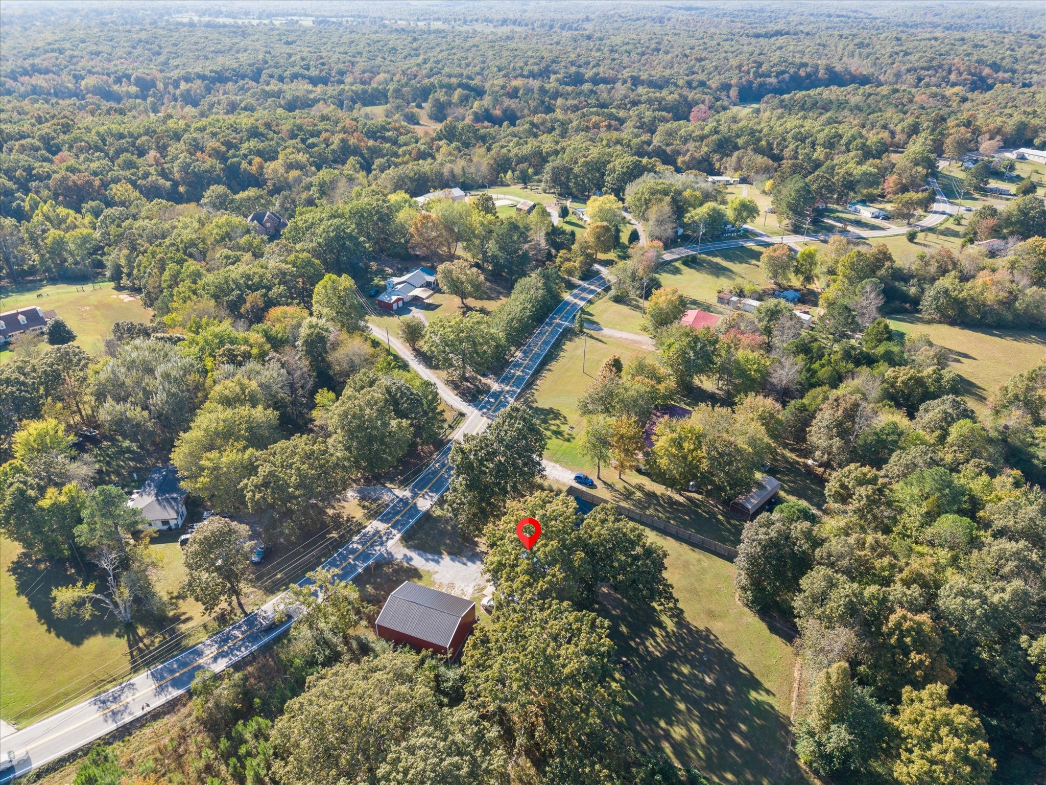 1318 Yellow Creek Road Dickson, TN 37055 - Photo 32 of 37 an aerial view of residential houses with city and green space