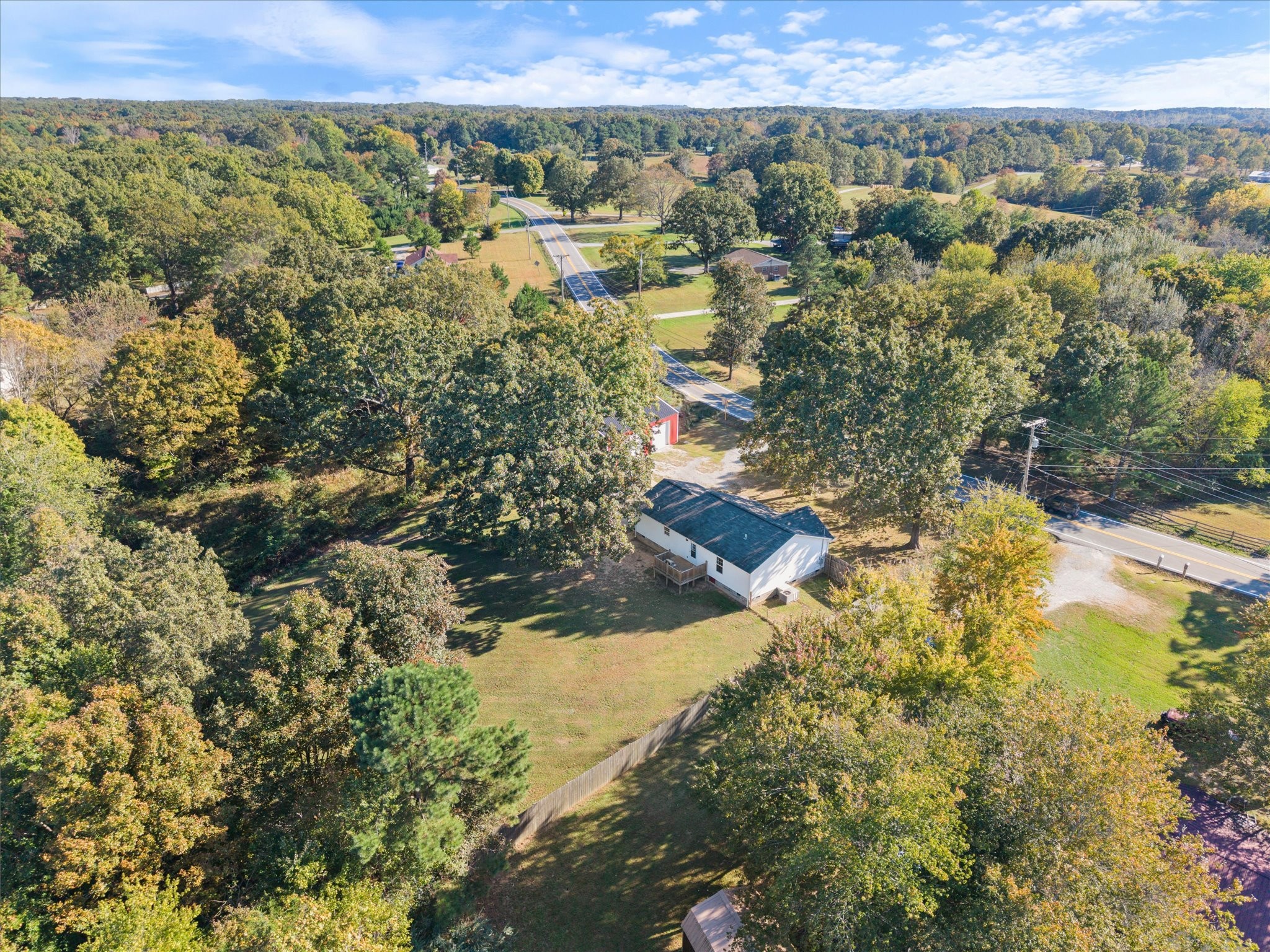 1318 Yellow Creek Road Dickson, TN 37055 - Photo 34 of 37 a view of a city with lush green forest