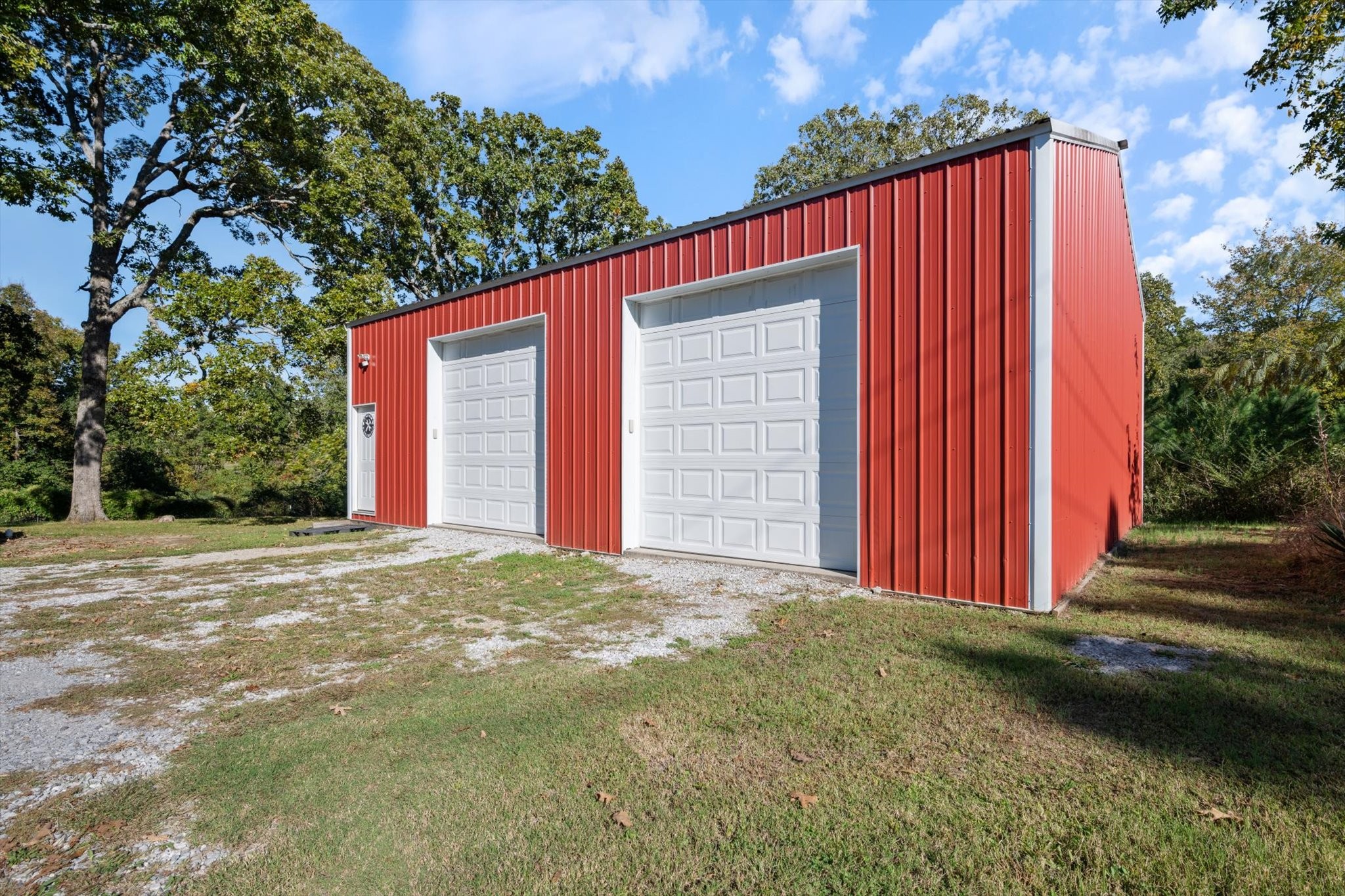 1318 Yellow Creek Road Dickson, TN 37055 - Photo 4 of 37 a view of a house with backyard and garage