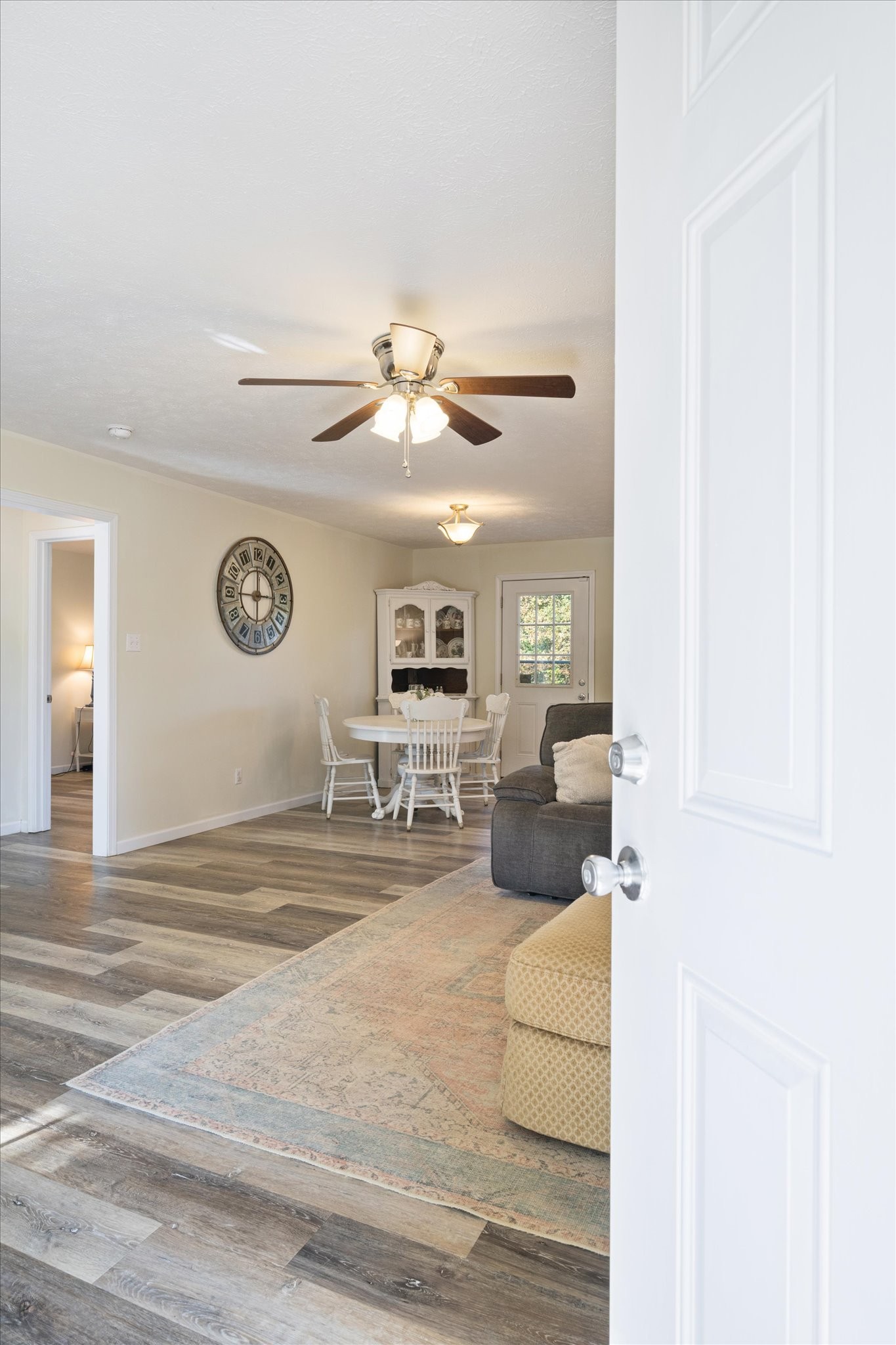 1318 Yellow Creek Road Dickson, TN 37055 - Photo 8 of 37 a view of a livingroom with furniture and a ceiling fan