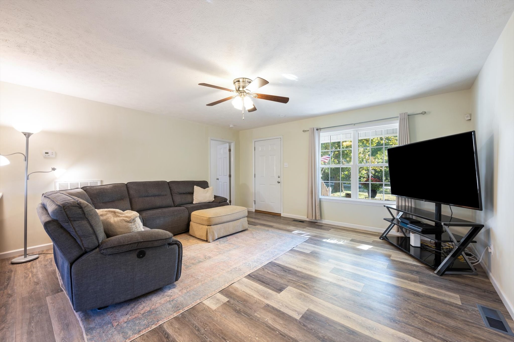 1318 Yellow Creek Road Dickson, TN 37055 - Photo 10 of 37 a living room with furniture and a flat screen tv