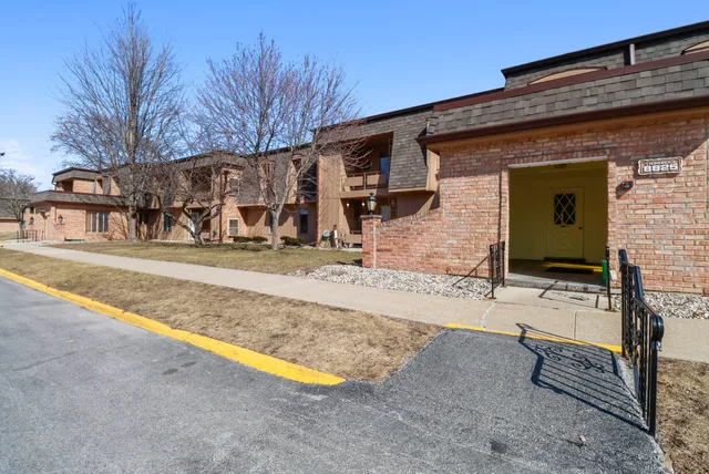 a building with trees in front of it