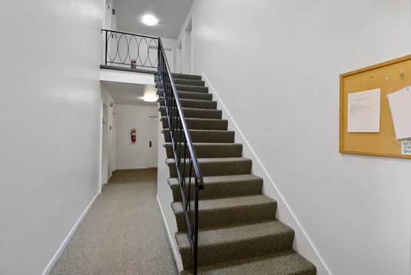 a view of an entryway with stairs