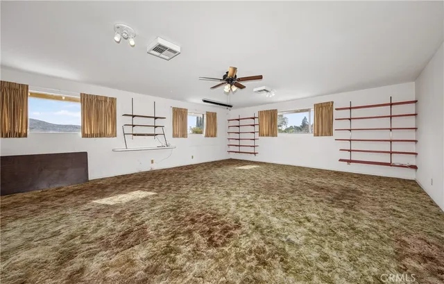 a view of a livingroom with a fireplace