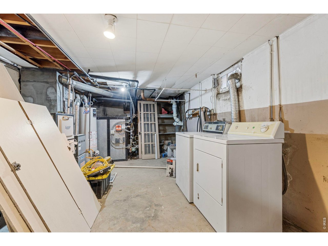 21 North Rutherford Avenue Johnstown, CO 80534 - Photo 25 of 50 Basement laundry & storage room