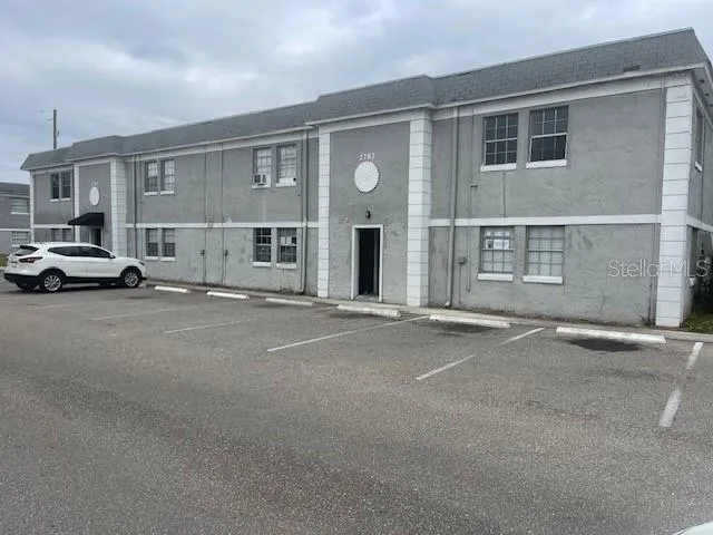 a view of street with large buildings
