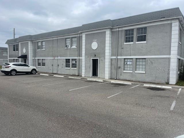 a view of street with large buildings