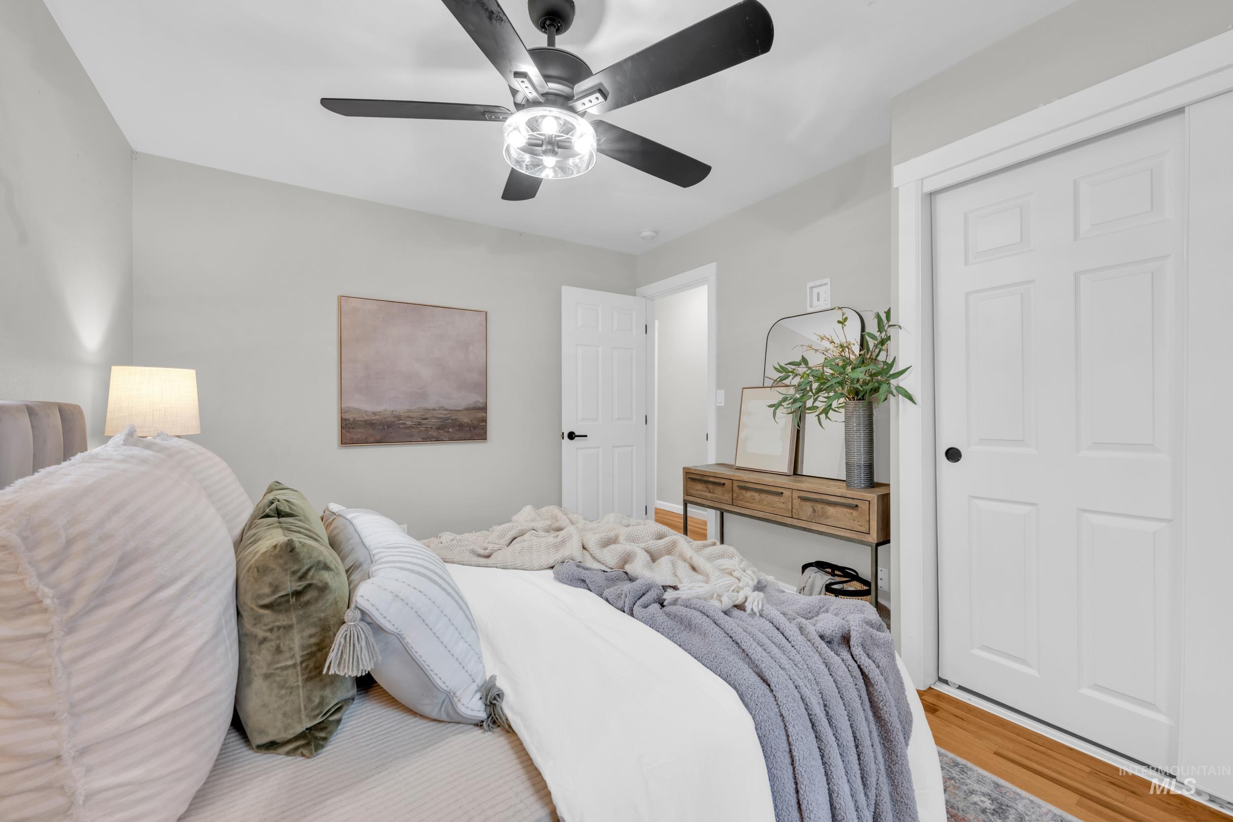 2908 Meadowbrook Drive Boise, ID 83705 - Photo 21 of 29 Bedroom with wood finished floors and a ceiling fan