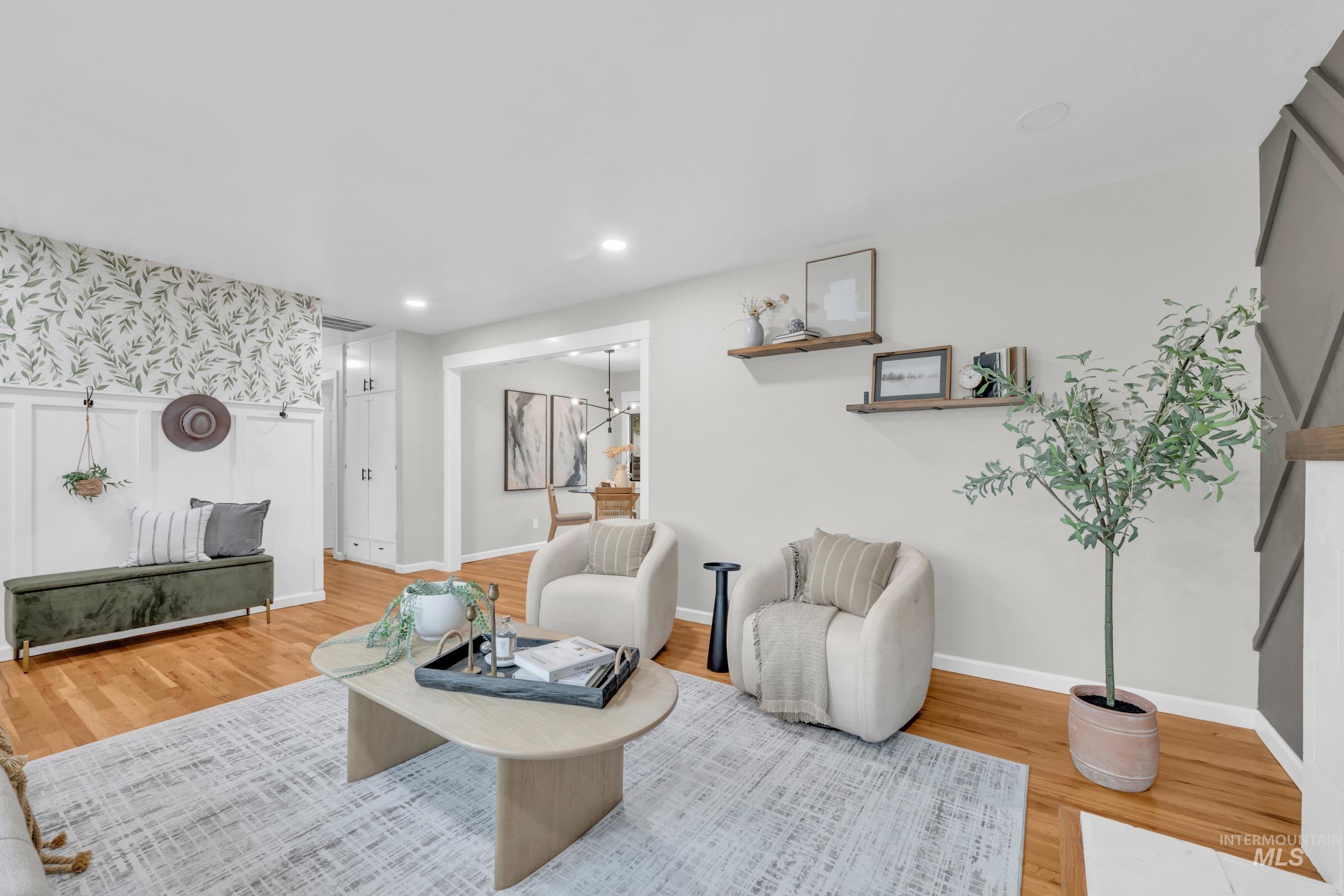 2908 Meadowbrook Drive Boise, ID 83705 - Photo 8 of 29 Living area featuring wallpapered walls, wood finished floors, and recessed lighting