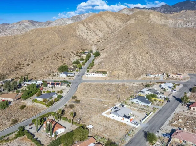 a view of ocean and mountain