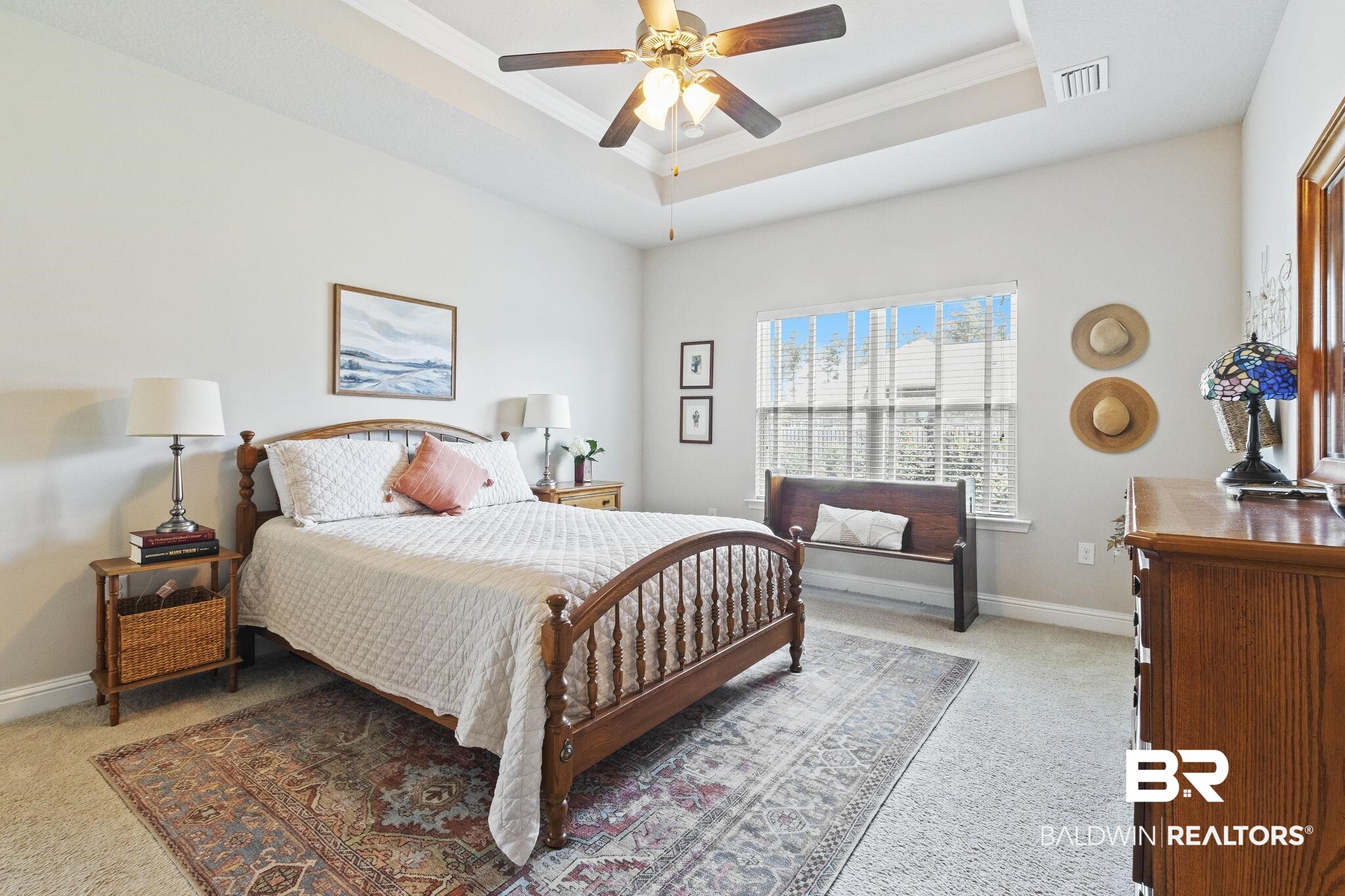 31663 Kestrel Loop Daphne, AL 36527 - Photo 34 of 86 Bedroom with carpet flooring, ceiling fan, and a tray ceiling