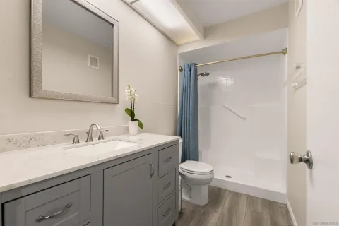 a room with a bed and a window