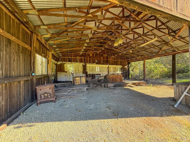 a view of a room with wooden walls