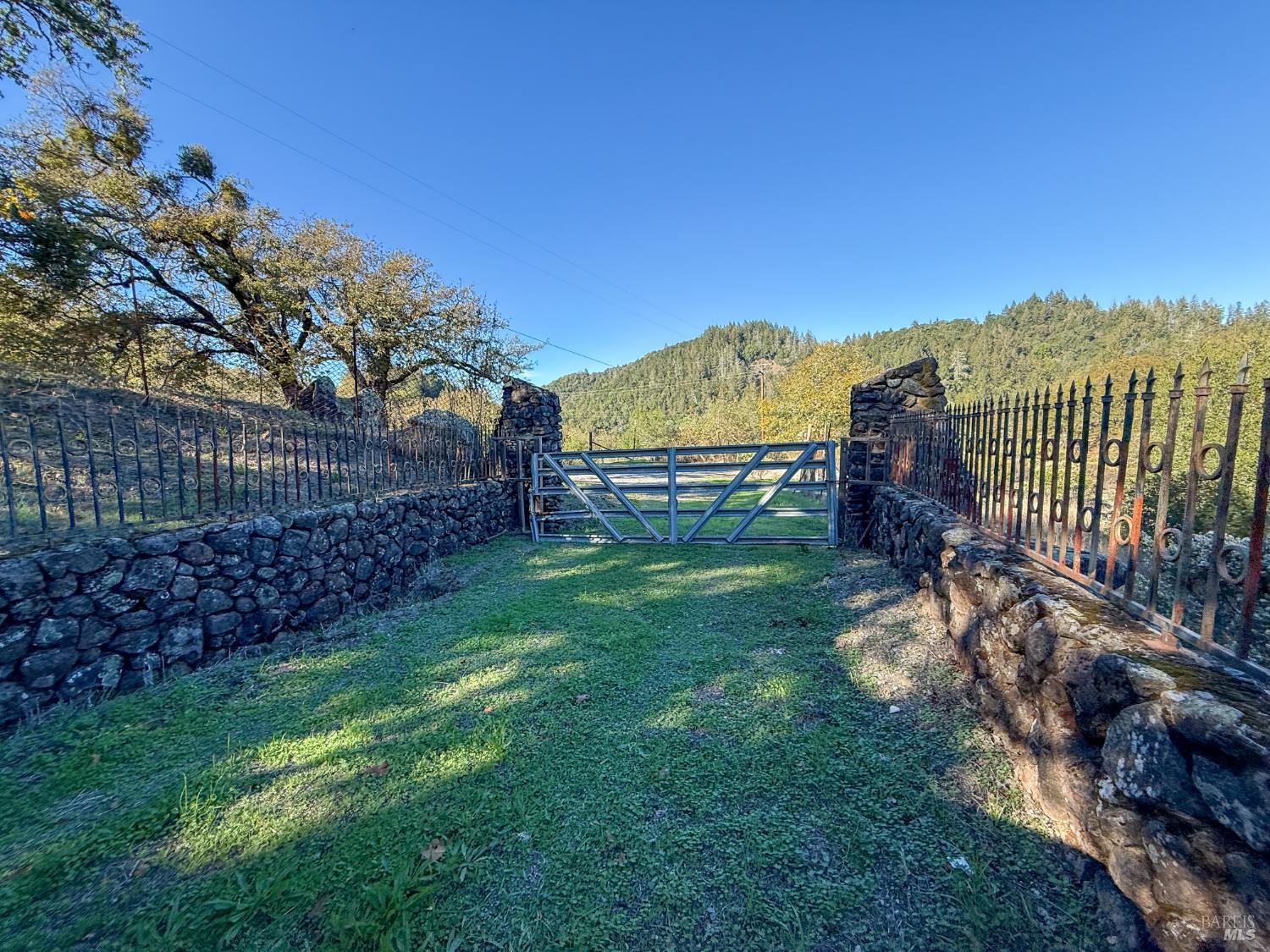2300 Brack Road Healdsburg, CA 95448 - Photo 40 of 41 a view of a garden with a building in the background