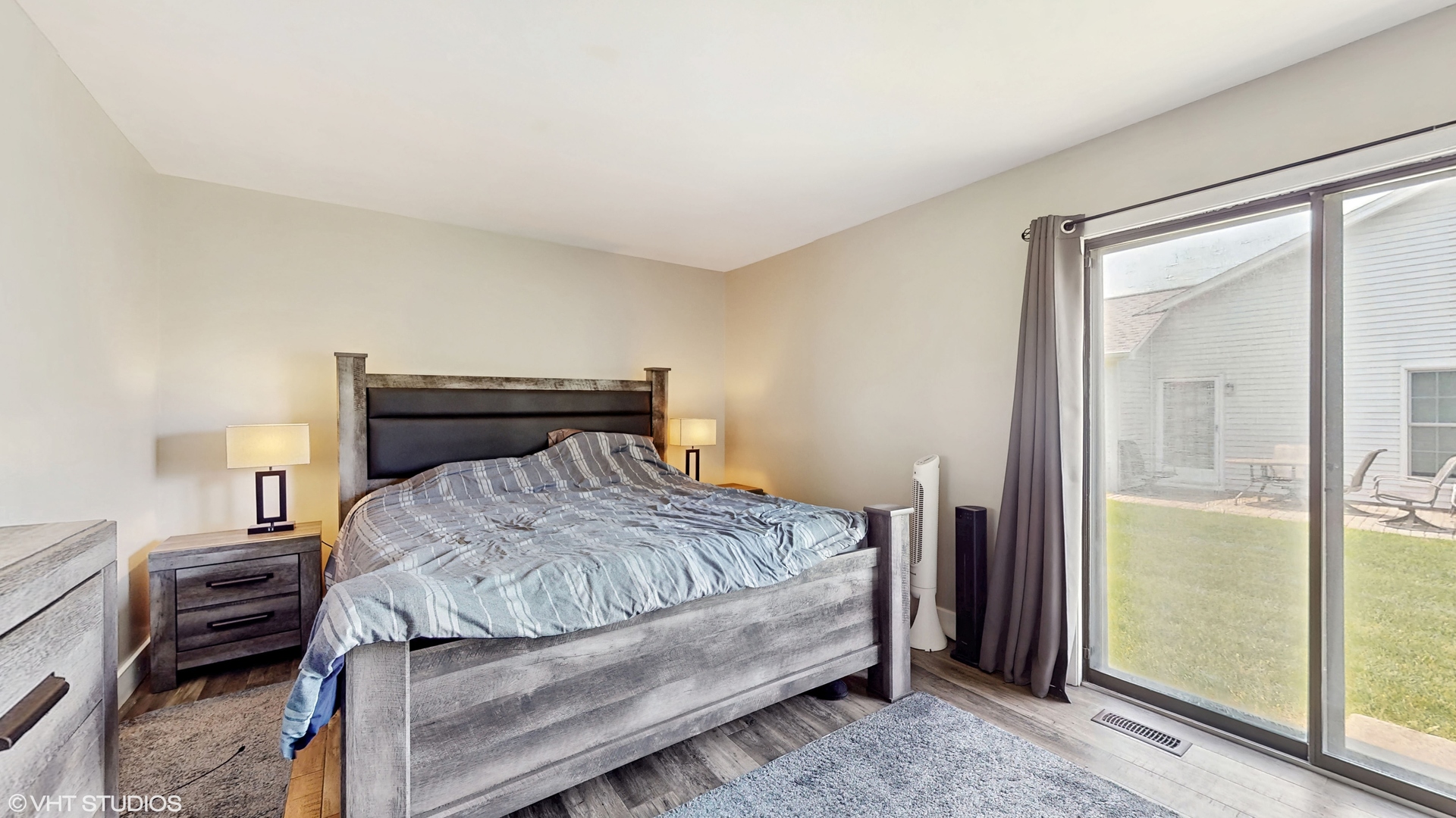 267 Juniper Circle Streamwood, IL 60107 - Photo 13 of 25 a bedroom with a bed and wooden floor
