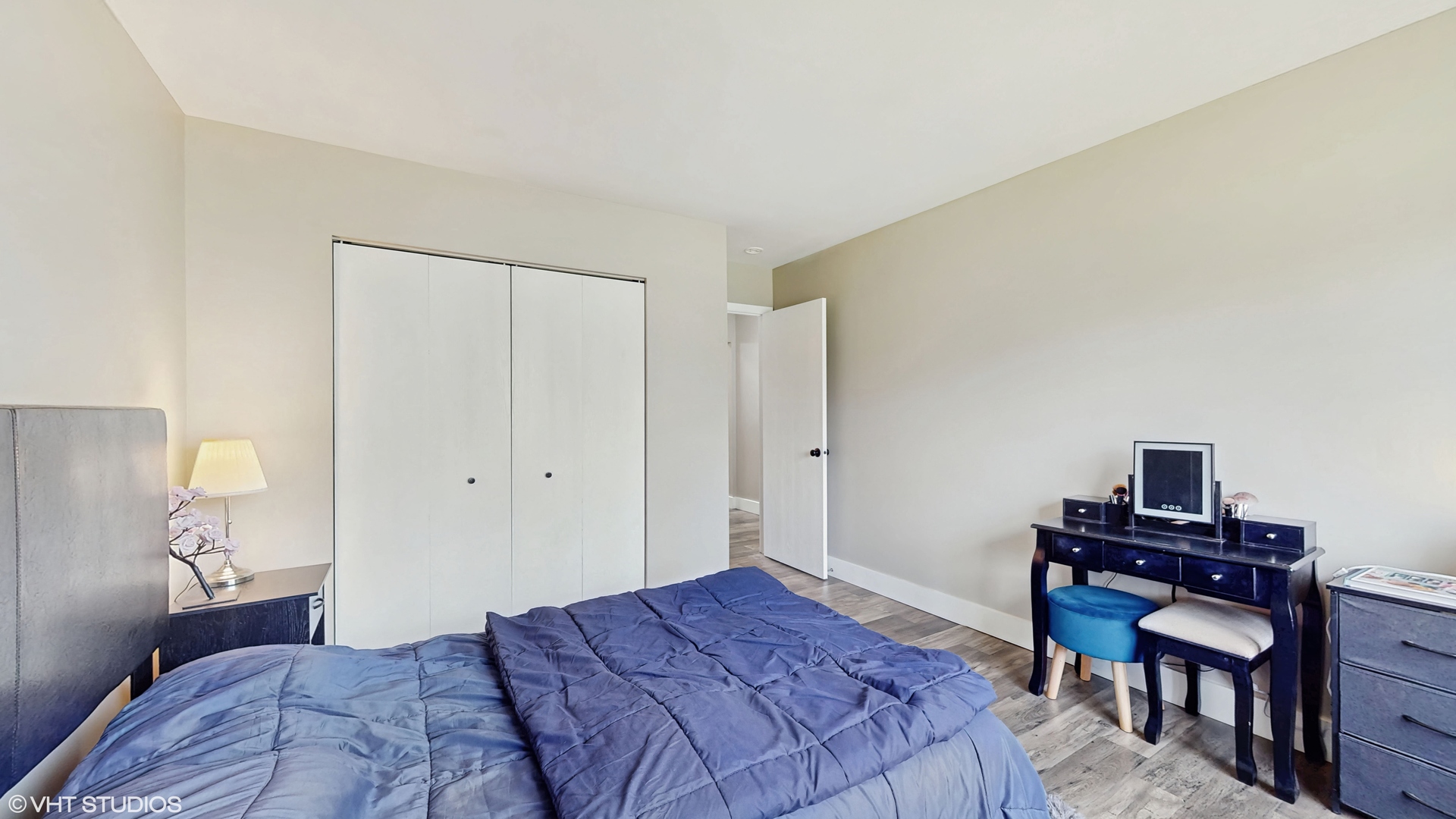 267 Juniper Circle Streamwood, IL 60107 - Photo 19 of 25 a bedroom with a bed and a table