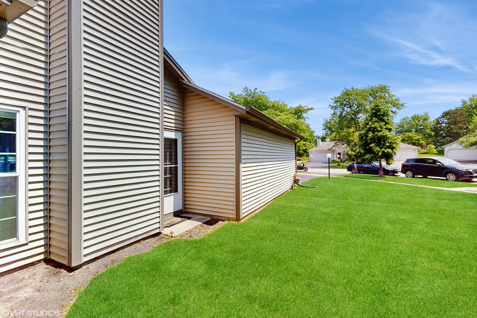 267 Juniper Circle Streamwood, IL 60107 - Photo 21 of 25 a view of a house with a backyard