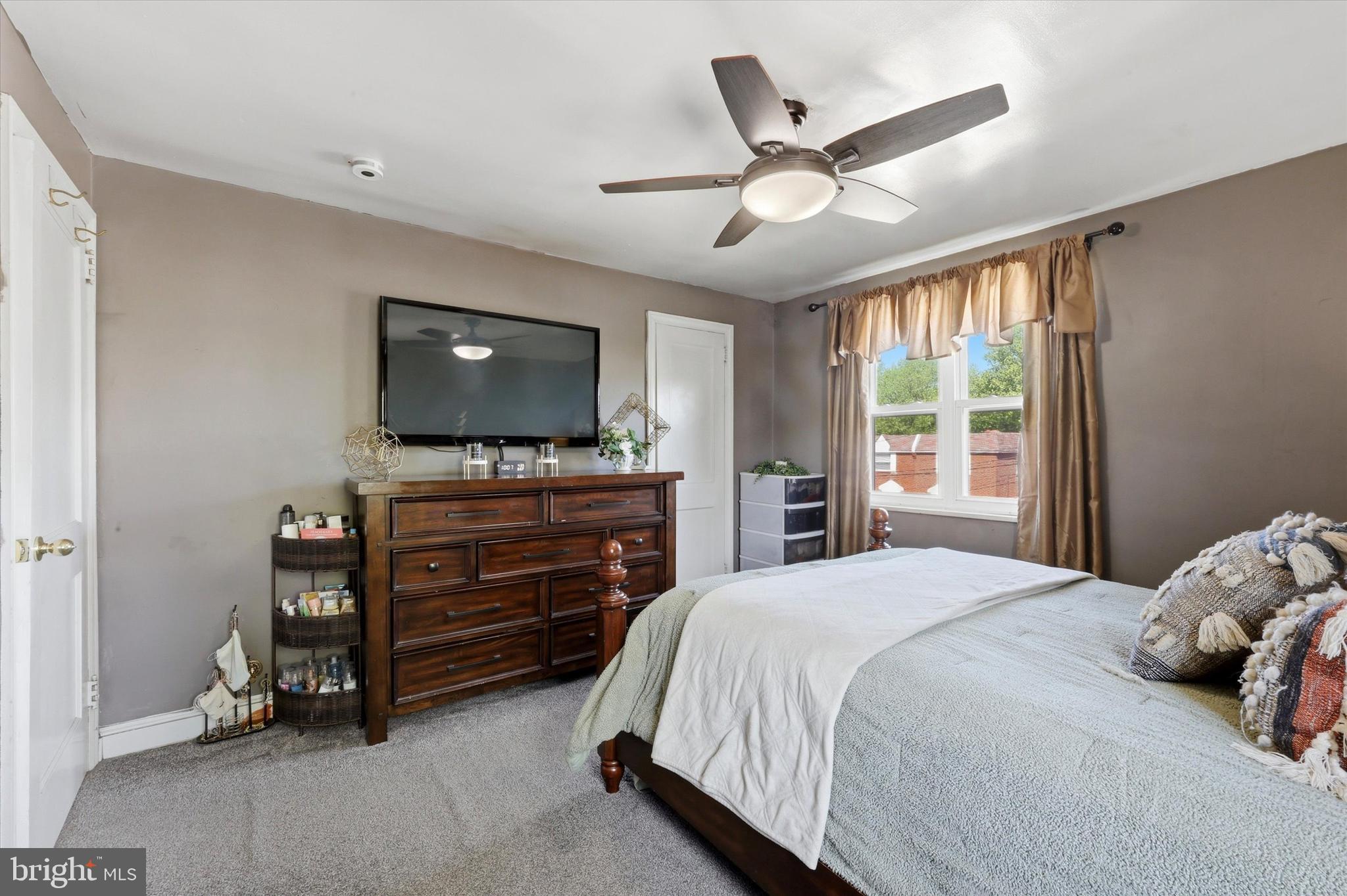 1801 Cricket Lane Folcroft, PA 19032 - Photo 11 of 22 a bedroom with a bed and a flat screen tv