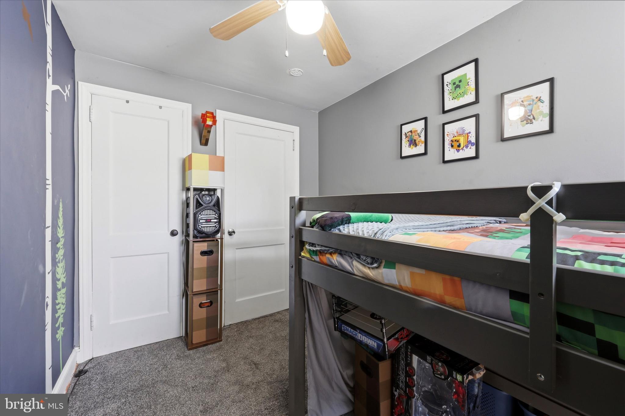 1801 Cricket Lane Folcroft, PA 19032 - Photo 14 of 22 a view of a bedroom with a bed and a bookshelf