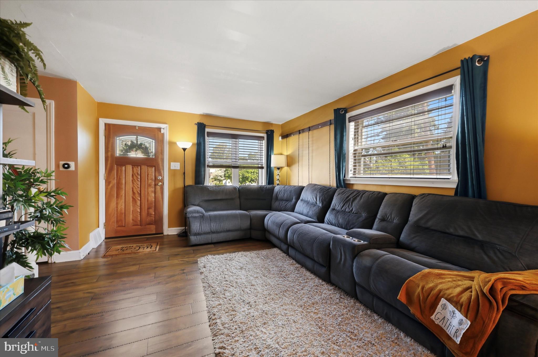 1801 Cricket Lane Folcroft, PA 19032 - Photo 2 of 22 a living room with furniture and a window