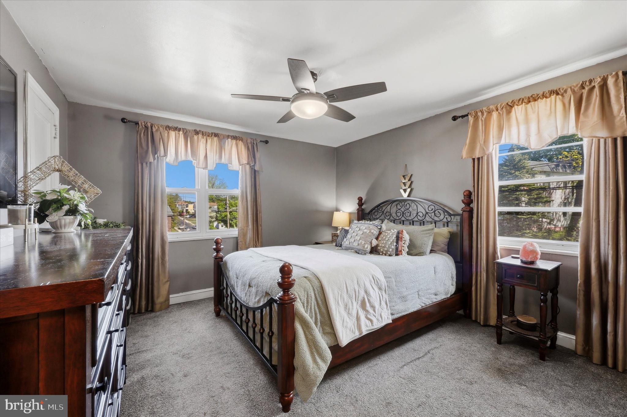 1801 Cricket Lane Folcroft, PA 19032 - Photo 10 of 22 a bedroom with a bed and a table
