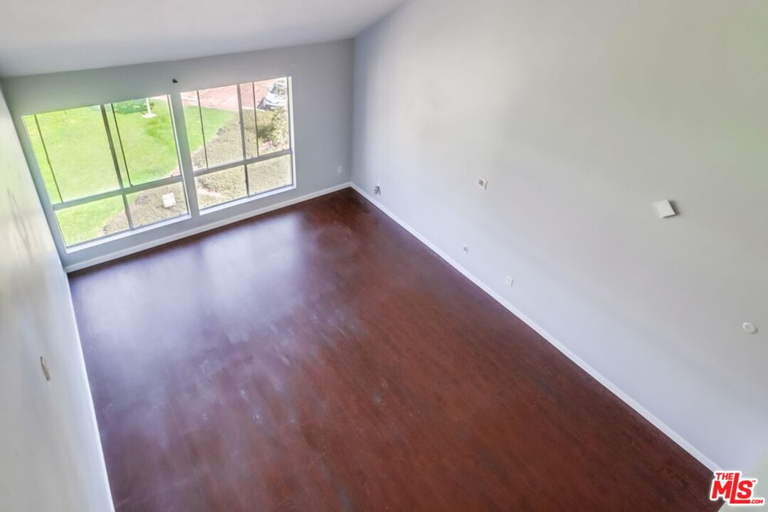 6171 Rancho Mission Road, Unit 317 San Diego, CA 92108 - Photo 15 of 26 a view of an empty room with a window
