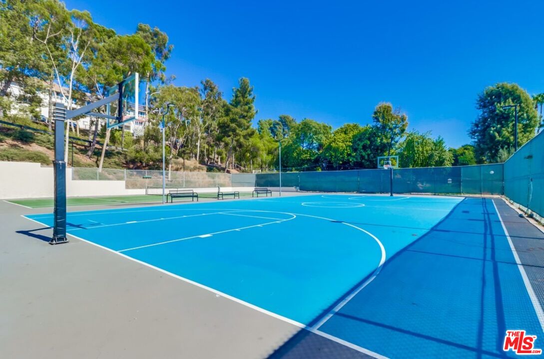6171 Rancho Mission Road, Unit 317 San Diego, CA 92108 - Photo 25 of 26 a view of a tennis court