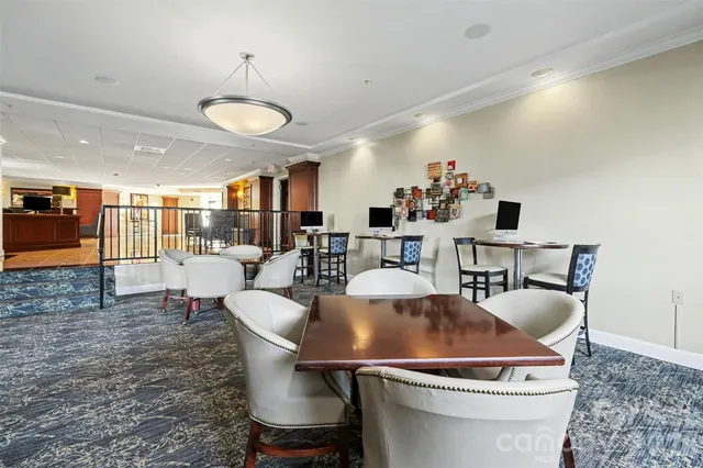 a dining room with a table or chairs and a dining table with wooden floor