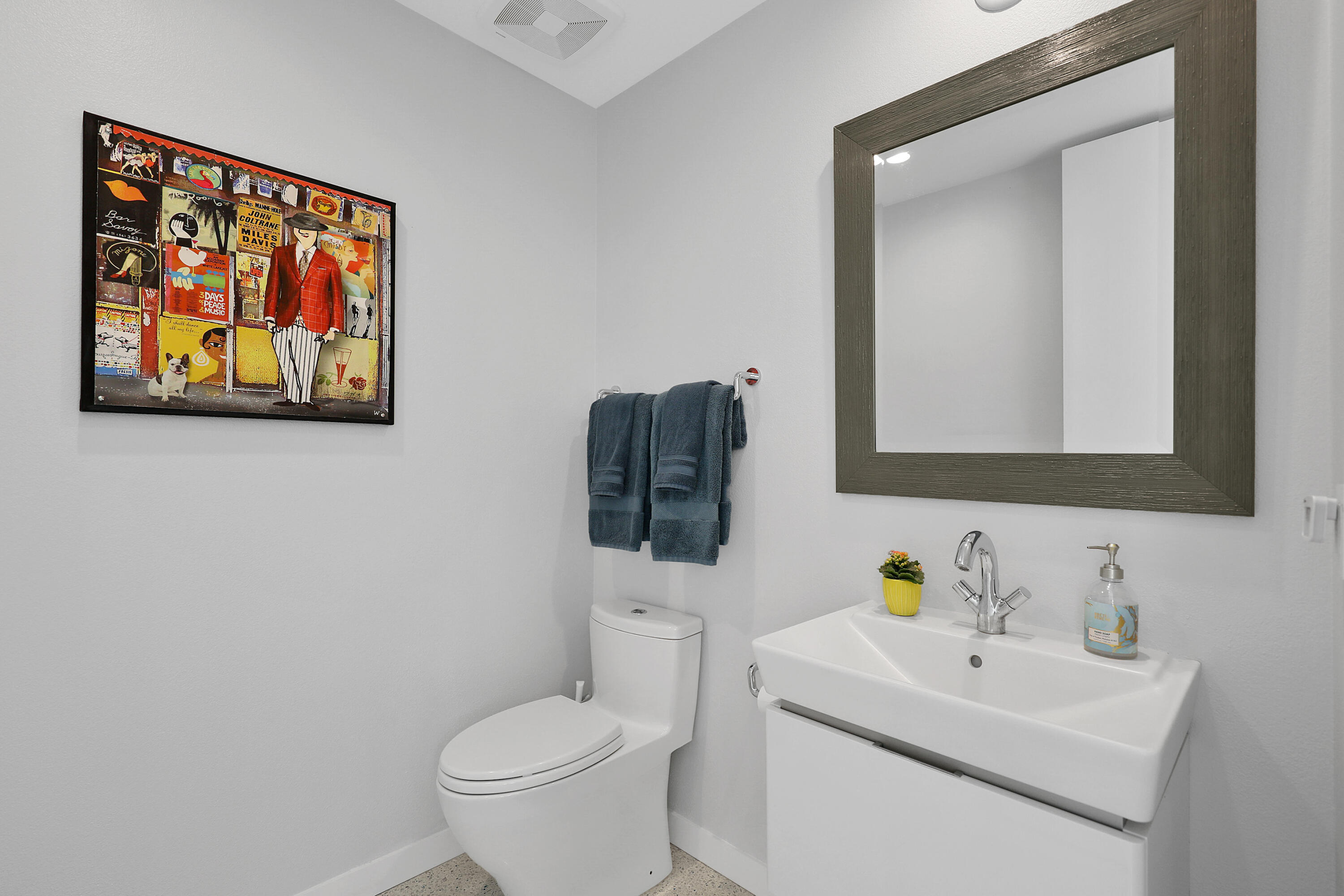 71390 Gardess Road Rancho Mirage, CA 92270 - Photo 25 of 54 a bathroom with a toilet sink and mirror