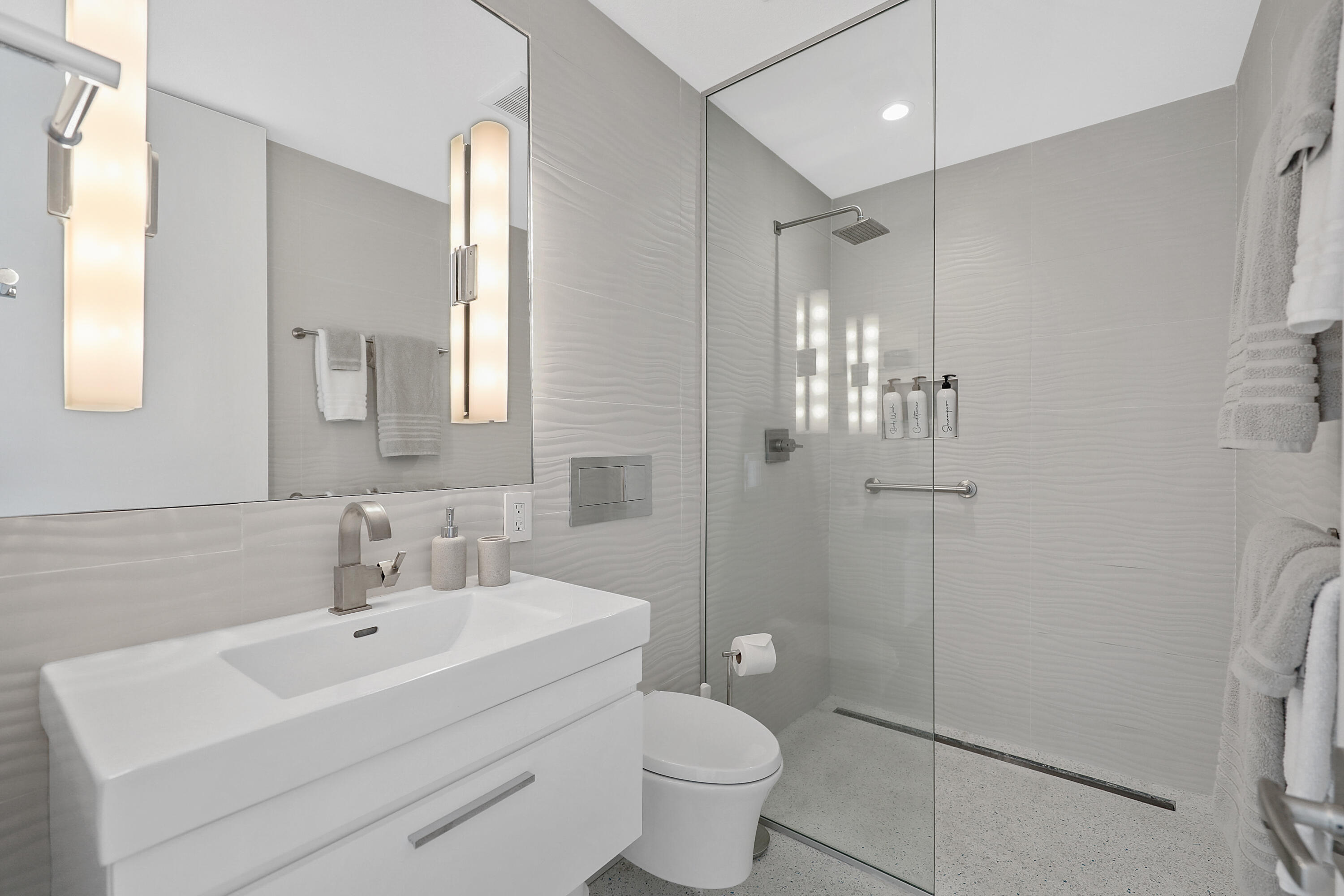 71390 Gardess Road Rancho Mirage, CA 92270 - Photo 35 of 54 a bathroom with a sink toilet and shower