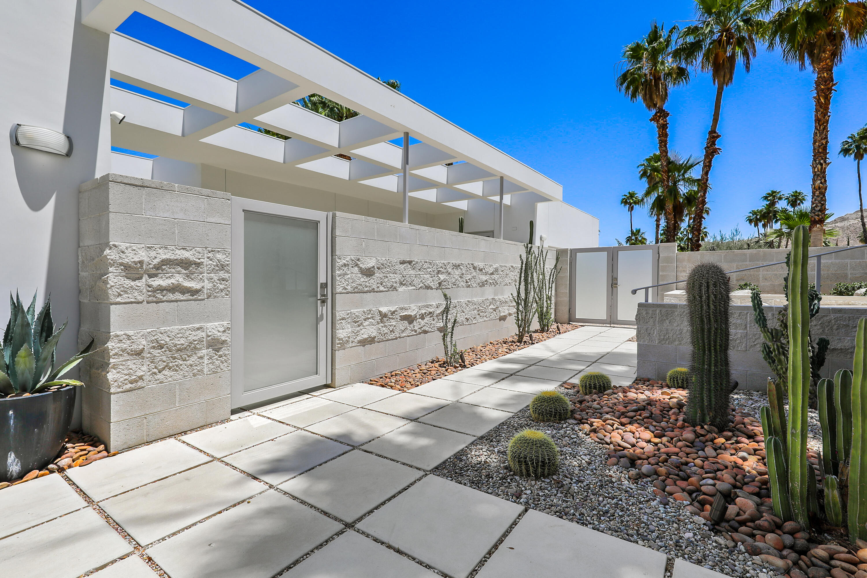 71390 Gardess Road Rancho Mirage, CA 92270 - Photo 7 of 54 a view of a entryway door of house
