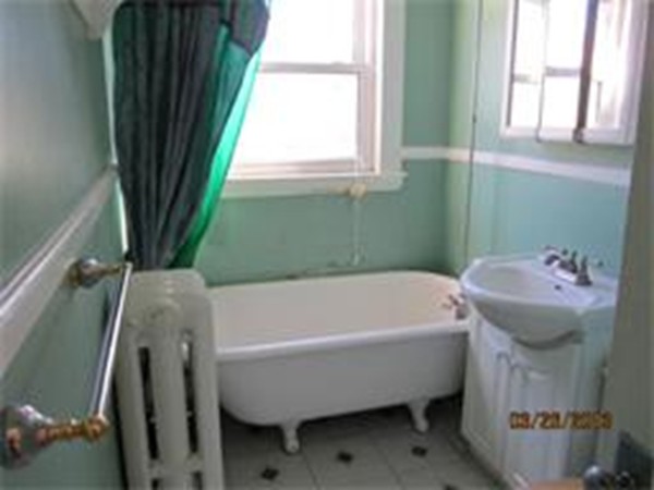 22 Riverside Avenue Gloucester, MA 01930 - Photo 11 of 13 a bathroom with a sink and a bathtub