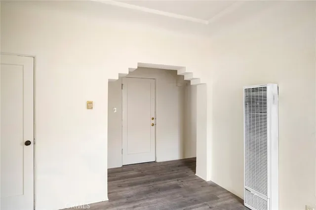 a view of cabinet with wooden floor