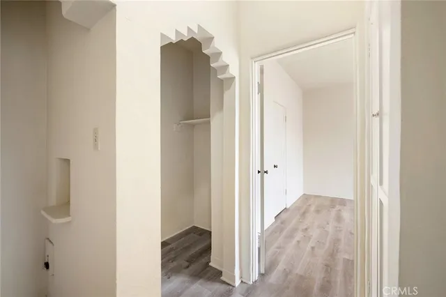 a view of a bathroom from a hallway