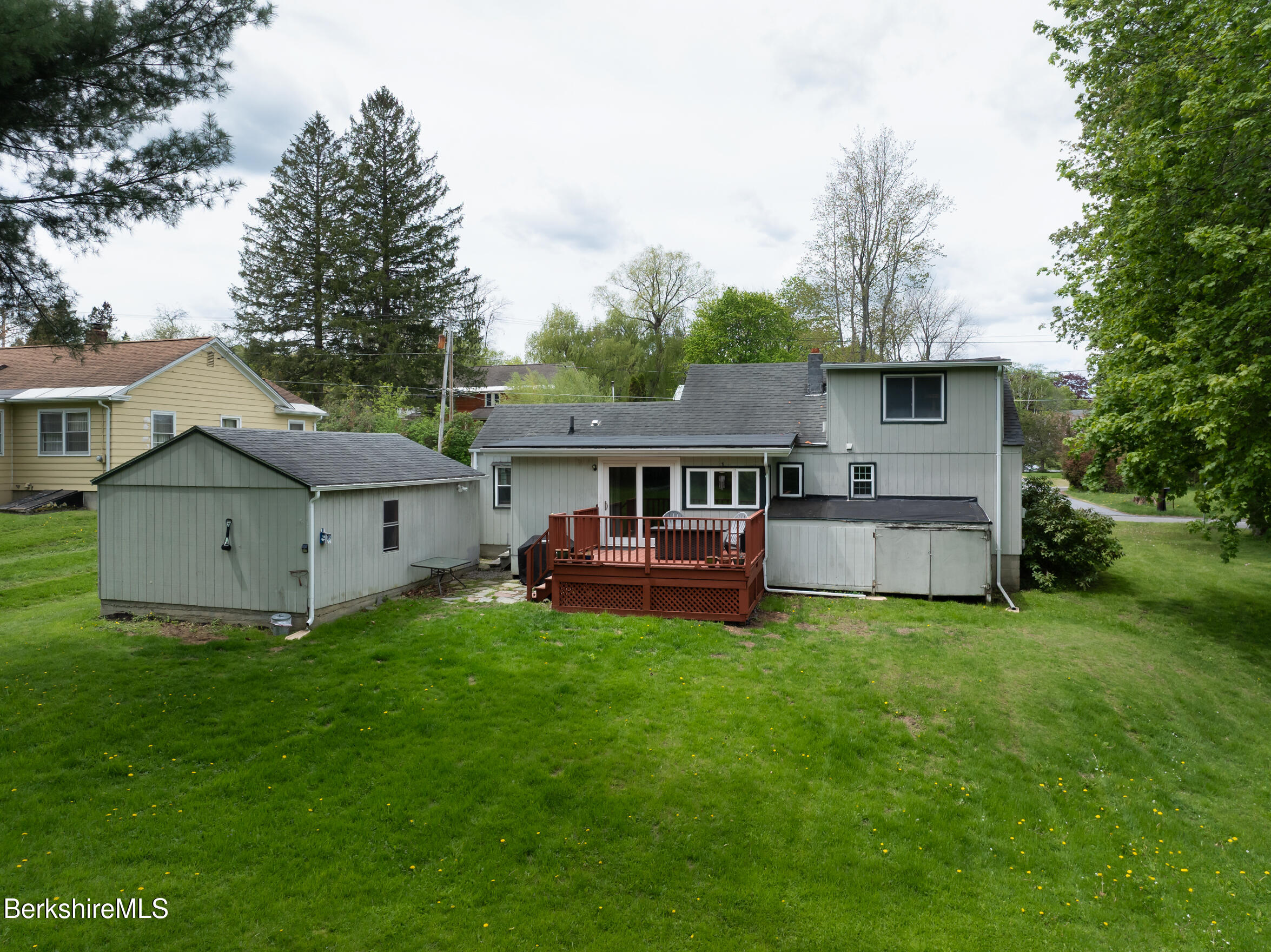 310 Luce Road Williamstown, MA 01267 - Photo 27 of 30 a view of a house with a yard and sitting area